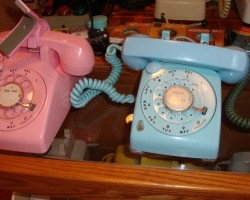 Note the blue phone with the light on.