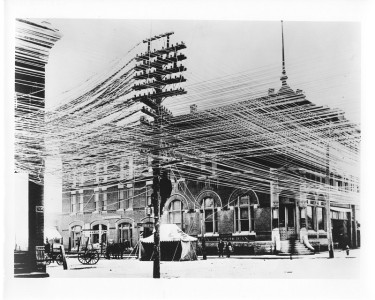 1900s-7 - Source: South West Bell Magazine 10/59
Maze of wires in Pratt, Kansas (1909) was only a hint of the coming impact of telephones in the Southwest.