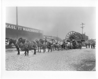 1910s-13 -
1911 -Eight-horse Wagon Team hauling cable reel.