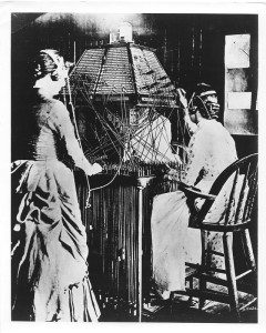 1881 -
Operators and pyramid switchboard, 1881.