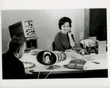 Picturephone Model 1, 1964 -
Text on the back of the photo, "64-108; One of many pictures in the report is that of equipment for the see-while-you-talk service now under experiment and test at Bell Telephone Laboratories. The time when such service may be introduced will depend on cost factors and market demand as well as on further technical development. Demonstrations of an experimental system will be made at the Bell System exhibit at the World 's Fair."