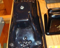 This device was an interface between a telephone and a radio. A phone converstaion could be transmitted and received via radio.