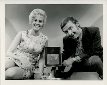 Picturephone Model II, 1971 -
Text on the back of the photo, "Jenny Grimm and Bob Kennedy, co-hosts of Channel 7's morning "Kennedy & Co." program, use Ill. Bell Telephone's new Picturephone to talk with Newton Minow, former FCC Chairman.
Picturephone units have been installed in three downtown Chicago locations, where passers-by will be able to dial the show and talk with Bob and Jenny and their guests. For the first time in history, the TV people will be able to see the viewers. WLS-TV"