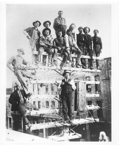 1890s-7 -
A safety-man's nightmare! This rugged plant crew of the 1890's celebrate the ,, completion of a pole line by having their picture snapped -atop the biggest pole.