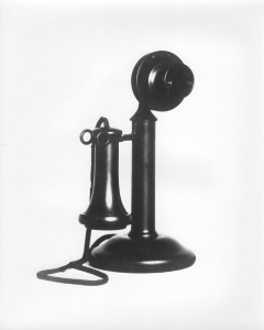 1910s-2 -
1910 Desk Set. This somewhat streamlined pedestal desk telephone first appeared in black finish.