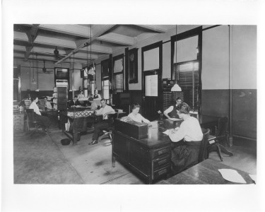 1920s-7 -
Assignment clerk's department showing exchange records maps and cable record card files. Dallas, Texas.