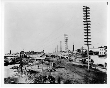 Plant Construction - Open Wire, Scene on West Street in New York City around 1888.