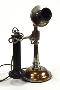 Title: Western Electric Number 10
Description: Metal desk stand / candlestick telephone made by Western Electric, with an early 7 digit transmitter marked 3492255 and unmarked long pole receiver. This telephone is also known as the Western Electric Number 10 desk set.
Date: Circa 1899