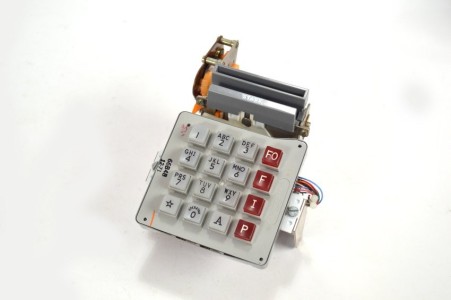 Title: Autovon card dialer mechanism
Description: Autovon card dialer mechanism.